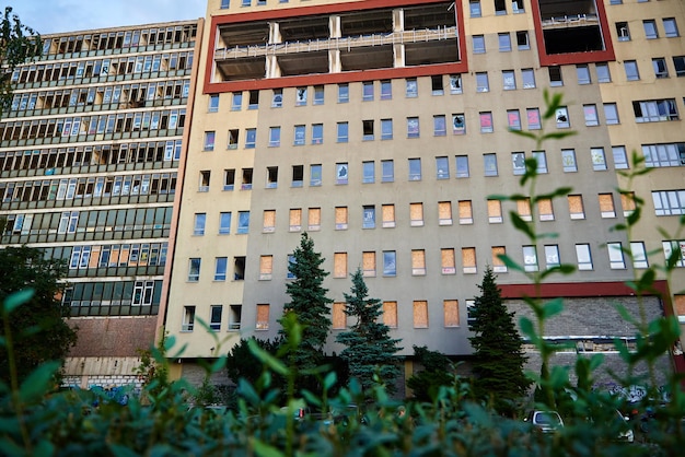 Abandoned residential building with broken windows