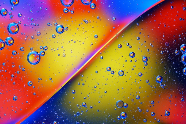 Abstract background of colorful bubbles on the surface of water and oil for your design.