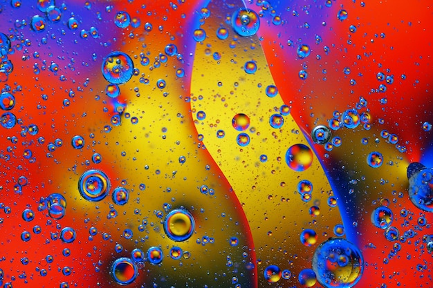 Abstract background of colorful bubbles on the surface of water and oil for your design.