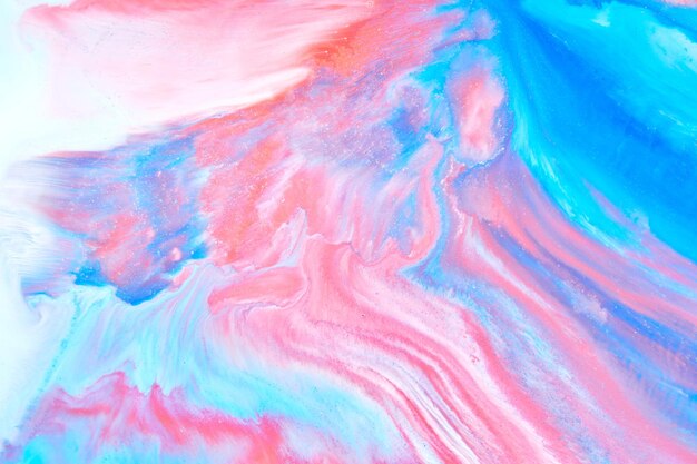 Abstract background liquid art paint stains and blots pink alcohol ink multicolored marble texture