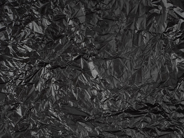 Abstract background made of black shiny plastic