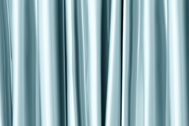 Abstract background of smooth silky blue curtains with soft folds