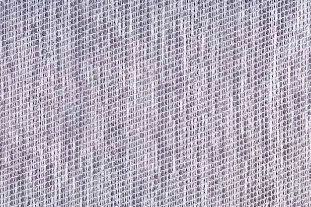 Abstract background of soft textured fabric in gray and white checkered