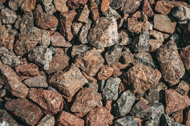 Abstract background texture Small brown stones closeup