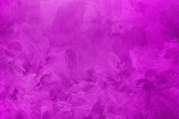 Abstract background of textured wall of pink color