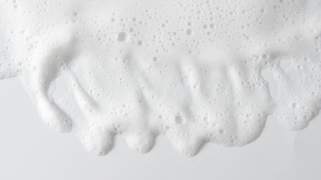 Abstract background white soapy foam texture Shampoo foam with bubbles