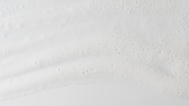 Abstract background white soapy foam texture Shampoo foam with bubbles