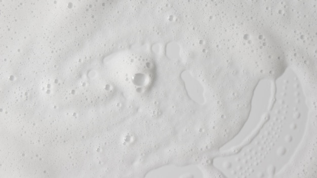 Abstract background white soapy foam texture Shampoo foam with bubbles