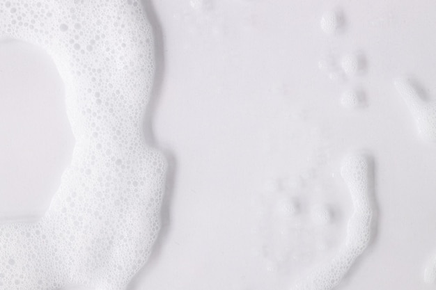 Abstract background white soapy foam texture Shampoo foam with bubbles