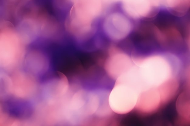 Abstract background with bokeh defocused lights and shadow.Multicolors bokeh.Vintage style.Disco lights.