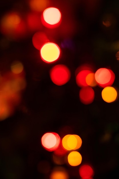 Abstract background with colorful sparkling bokeh on a dark background Holiday concept