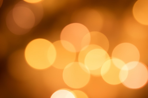 Photo abstract background with defocused golden lights