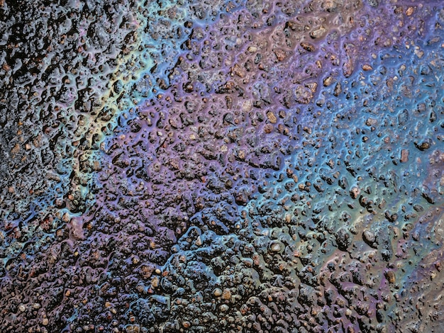 Abstract background with oil stain of oil products multicolored grunge texture