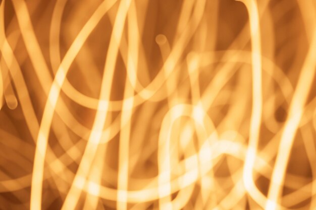 Photo abstract background of yellow white and orange blurred lights