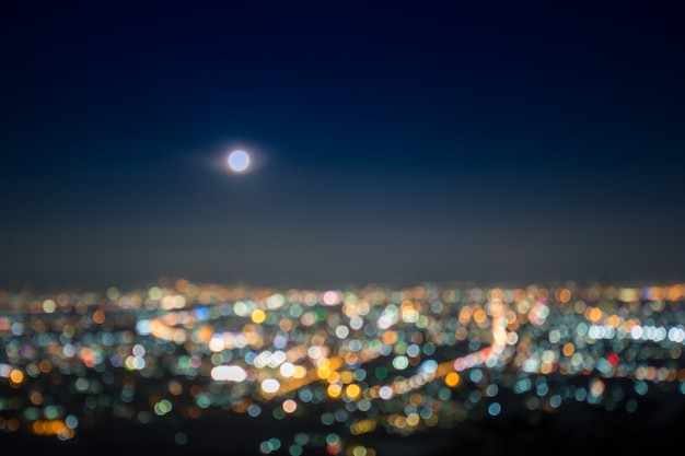 Photo abstract, beautiful bokeh landscape of city at night, bokeh light and blur city sunset