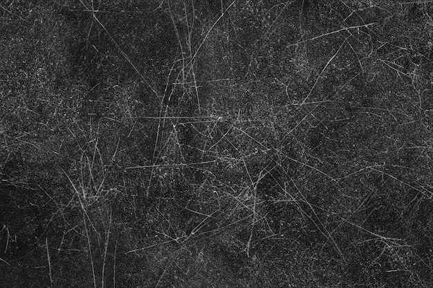 Abstract black textured with scratches background