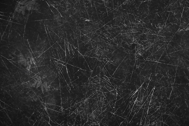 Abstract black textured with scratches background