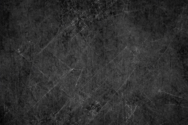 Abstract black textured with scratches background