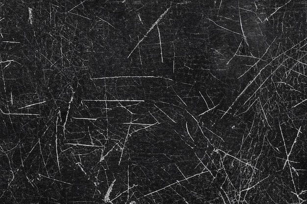 Abstract black textured with scratches background