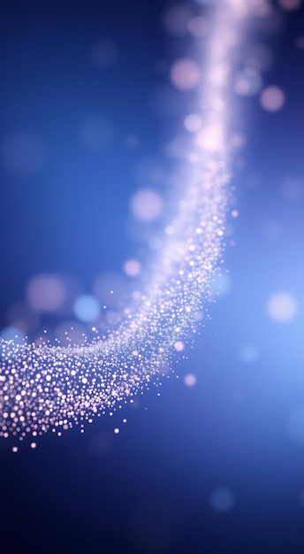 Abstract blue background with a trail of glittering white particles