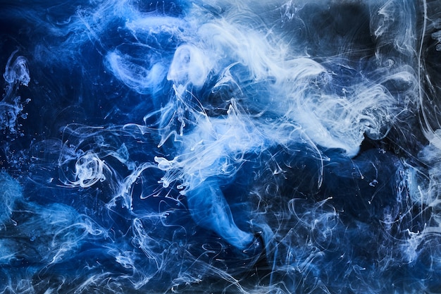 Abstract blue ocean background. Underwater swirling smoke, vibrant sea colors wallpaper, wave paint in water