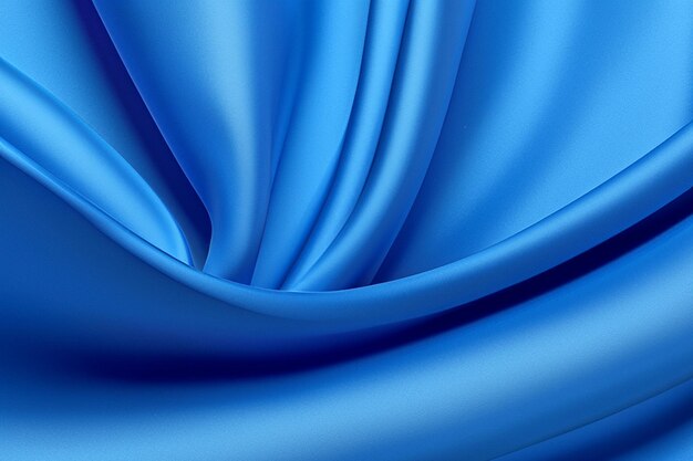 Abstract blue silky fabric folds and ripples creating a luxurious background texture