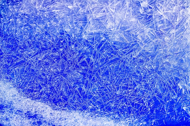 Abstract blue winter background with ice crystals Blank surface for a calendar or postcard with winter holidays and Christmas