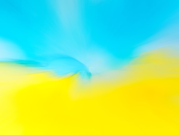 Abstract blue and yellow fragment of colorful background wallpaper Mixing acrylic paints Modern