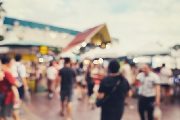 Photo abstract blur background in night market at shopping mall 