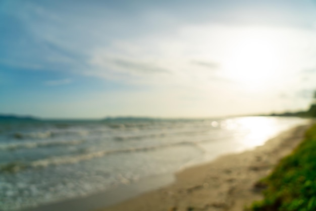 Abstract blur beautiful sea beach with sunset time for background