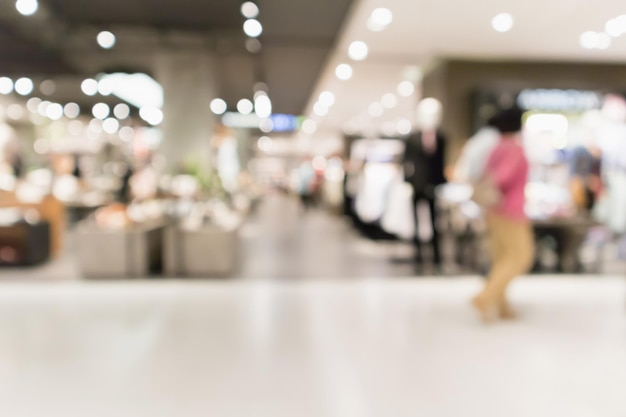 Abstract blur clothing boutique display interior of shopping mall background