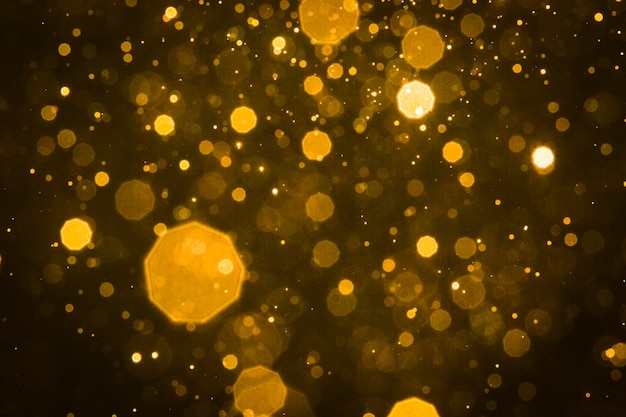 Abstract blur gold sparkle bokeh background