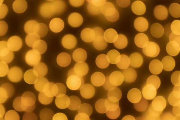 Abstract blur golden bokeh light Christmas holiday background