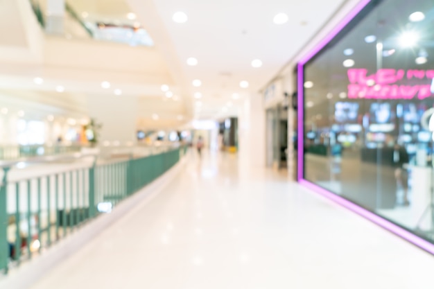 abstract blur shop and retail store in shopping mall for background