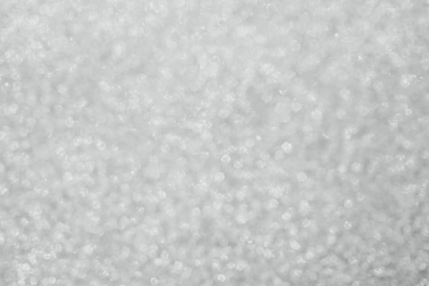 Abstract blur silver glitter sparkle defocused bokeh light background