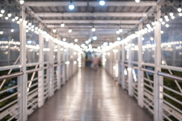 Abstract blur white background contemporary walkway bridge with light