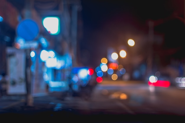 Abstract Blurred image of Street night market with light bokeh for background usage