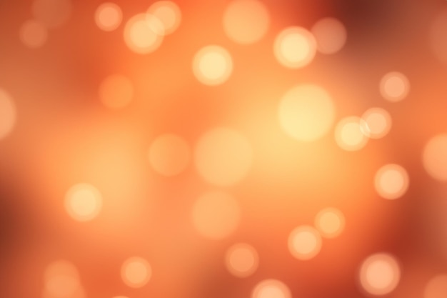 Abstract bokeh background with warm orange tones and soft outoffocus lights