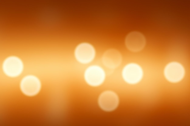 Photo abstract bokeh background with white circles on a golden orange background