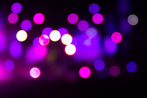 Abstract bokeh defocused purple light for background