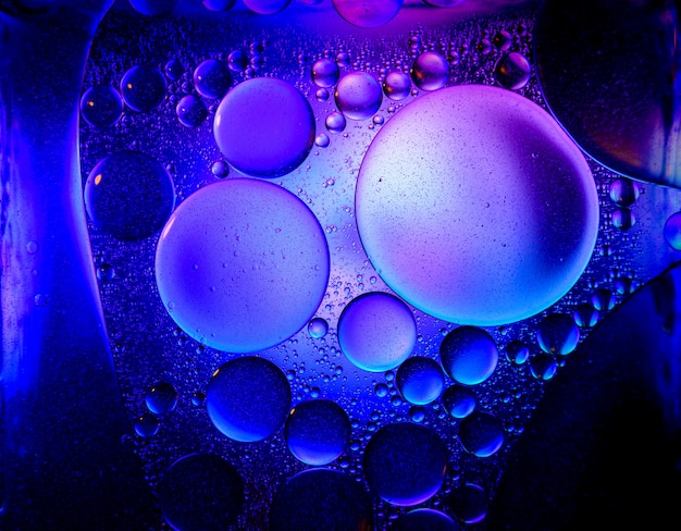 Abstract bubbles in a liquid with colorful lights