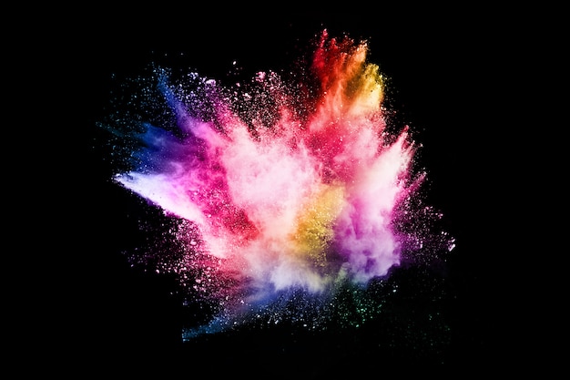 abstract colored dust explosion on a black background.