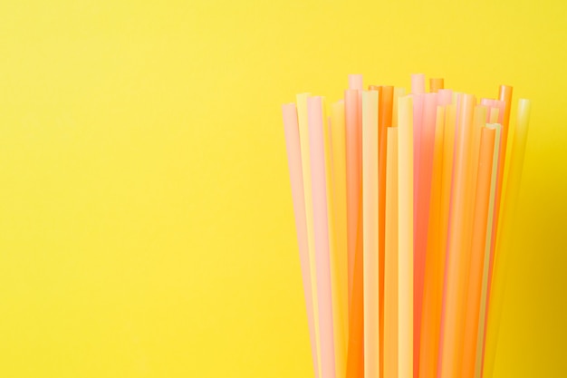 Abstract a colorful of plastic straws used for drinking water or soft drinks. Selective focus. Copy space