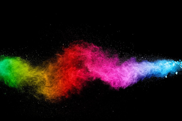 Abstract colorful powder explosion on black backgroundFreeze motion of dust splashPainted Holi