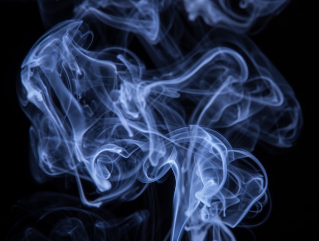 Abstract colorful smoke isolated on black background, fire design