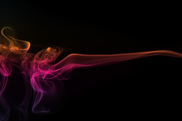 Abstract colorful smoke pattern on black background