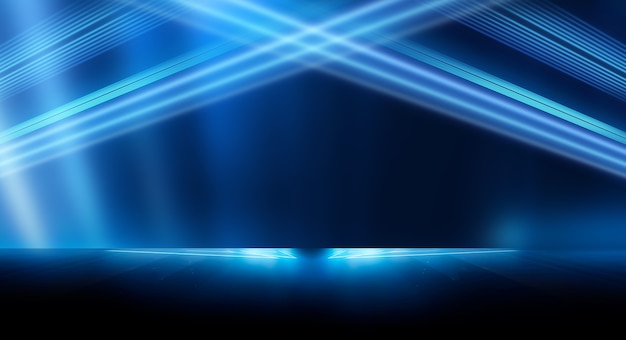 Abstract dark futuristic background Blue neon light rays reflect off the water