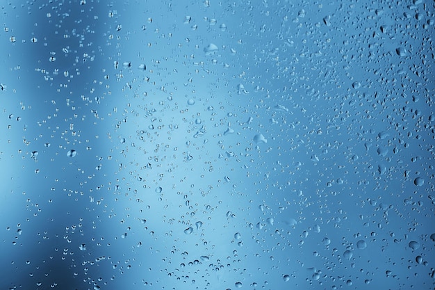 abstract drops glass background / texture fog rain, seasonal background, clear glass with water