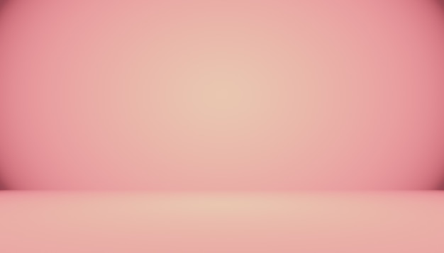 Abstract empty smooth light pink studio room background use as montage for product displaybannertemp...