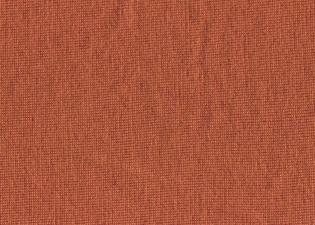 Abstract fallow orange soft knitted pattern textured. Natural sandy orange color texture of boho woven canvas with copy space.